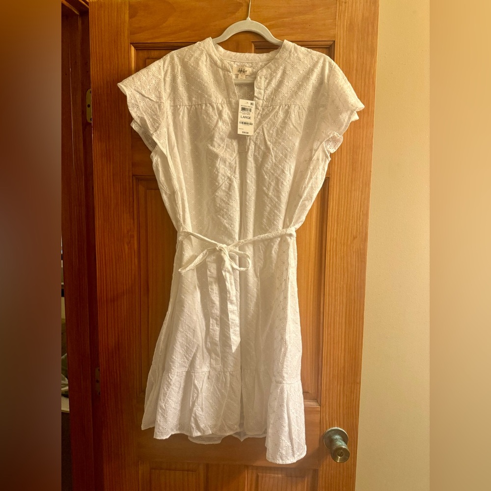 NWT adorable white eyelet dress perfect for summer vacation and white parties!